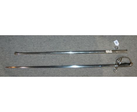 A Continental sword in metal scabbard, the blade stamped, blade and hilt 103cm Condition Report: Available upon request