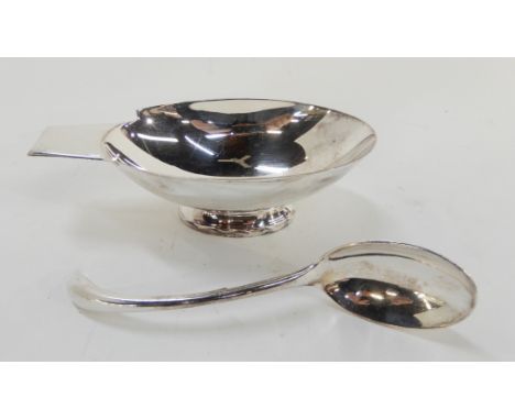 A silver plated sauceboat by Christofle, of modernist design with ladle with birds head terminal (2), 20cm long Condition Rep