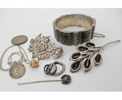 A silver and enamel Portuguese vintage bangle, silver large floral brooches and other items Condition Report: Not available f