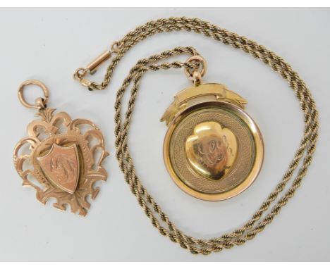 Two 9ct gold medallions, one a Dux medal with a 9ct gold vintage chain, weight 24.7gms Condition Report: Larger a Dux medal, 