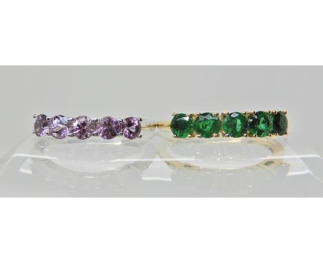 A 9ct white gold amethyst set ring, size N1/2, together with a 9ct yellow gold emerald set ring, size O, weight combined 4.1g