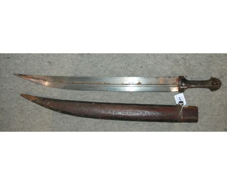 A Middle-Eastern sword in scabbard, blade and hilt 74cm Condition Report: Available upon request