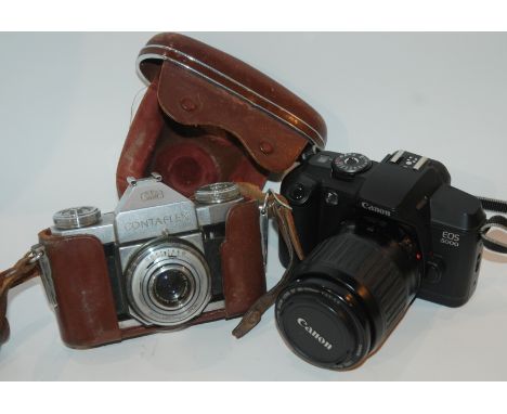 A Zeiss Ikon Contaflex camera in leather case, a Canon EOS5000 camera and another modern camera Condition Report: Available u