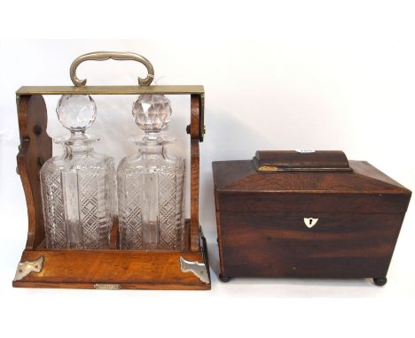 A sarcophagus shaped tea caddy and a two bottle Tantalus with Betjemanns patent lock, number 43884 Condition Report: Availabl