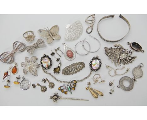 An enamel and gem set butterfly, amber pendants and a collection of silver and white metal items Condition Report: Not availa