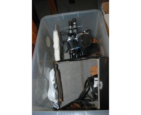 A Canon camera and collection of accessories Condition Report: Available upon request