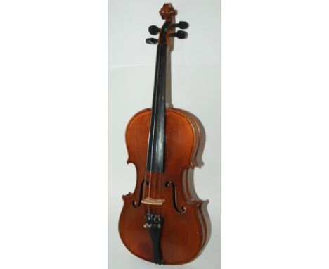 An early two-piece back violin, 36cm with interior paper copy of Stradivarius label with bow and case Condition Report: Avail