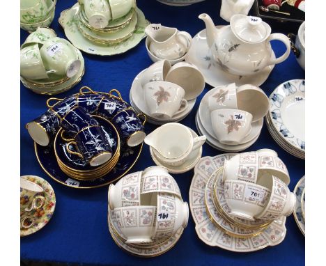 A Minton Tapestry teaset comprising eight cups, saucers and plates, cake plate, milk jug and sugar bowl, Royal Doulton Tumbli