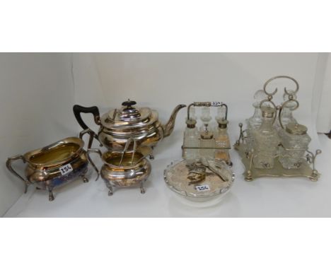 A tray lot of EP - tea service, cruet stands, butter dish etc Condition Report: Available upon request