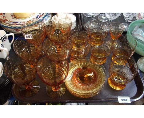 A Stuart cut crystal amber glass suite, some with Rd 681649 number together with Webb Corbett wine glasses etc Condition Repo