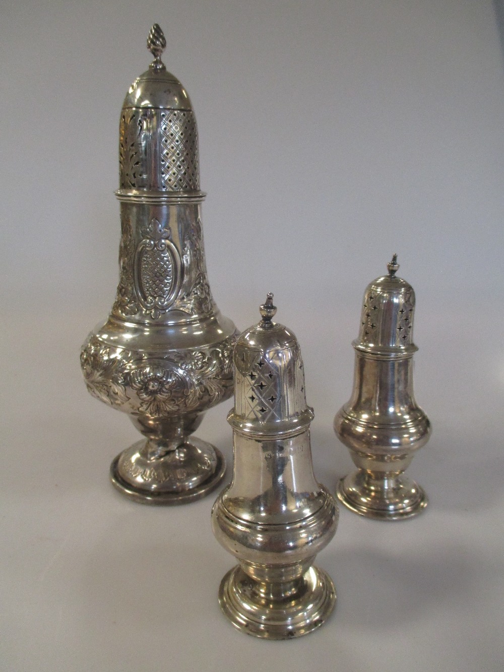 A pair of Victorian silver casters London 1897, and a large Victorian