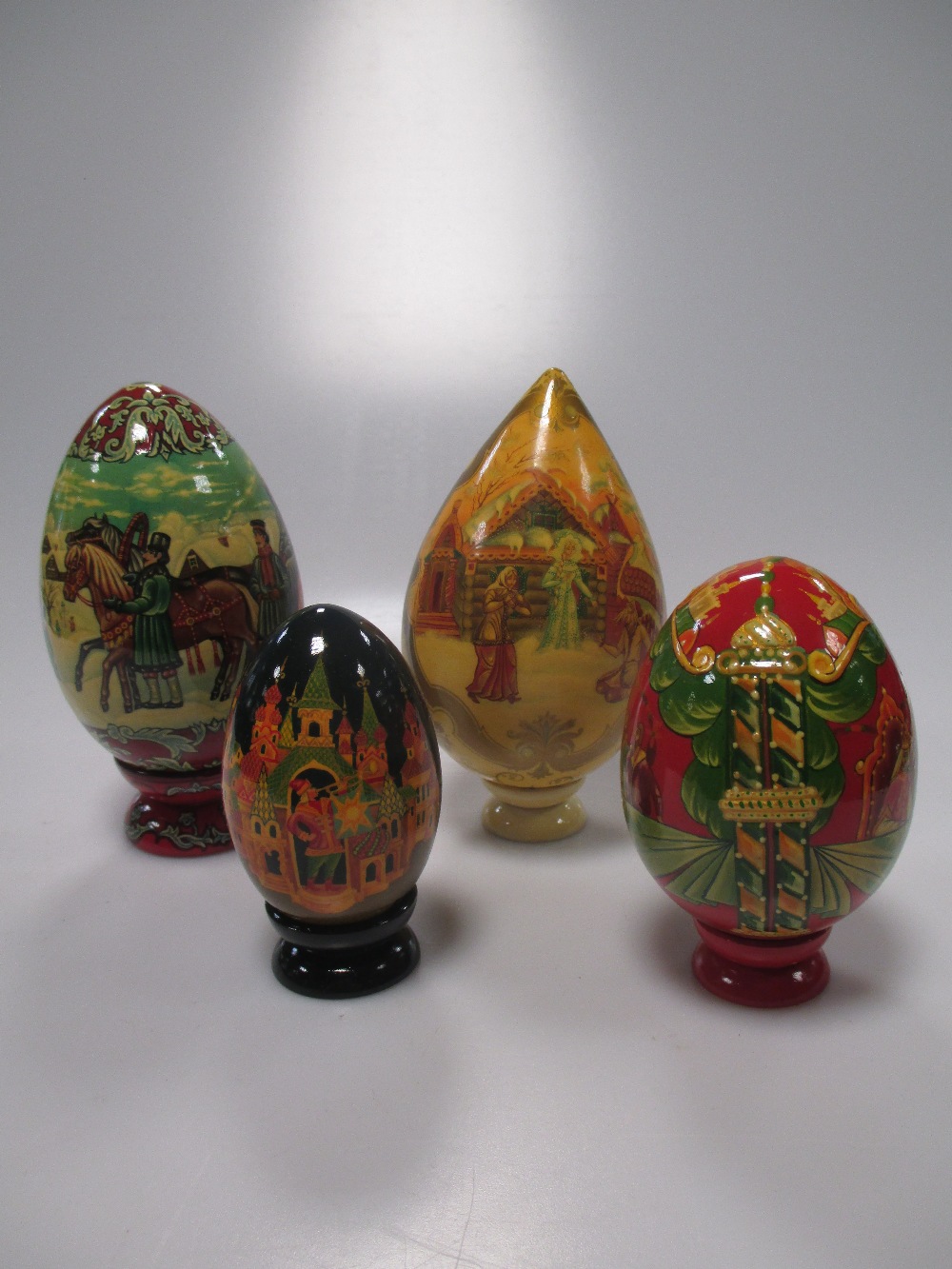 Fifteen various Russian painted eggs, all 20th century with religious
