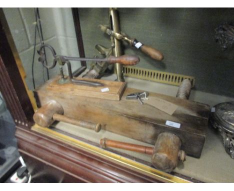 A bar mounted corkscrew, small patent corkscrew, a sugar cutter and wooden clamp  