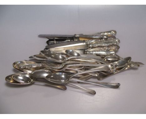 A collection of assorted silver flatware, some knives and a meat holder 40ozt weighable  