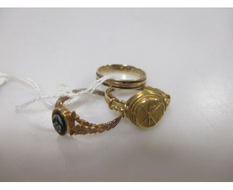 A ring with chi-rho monogram and two mourning rings, all test as gold, 5.8g gross (3)  
