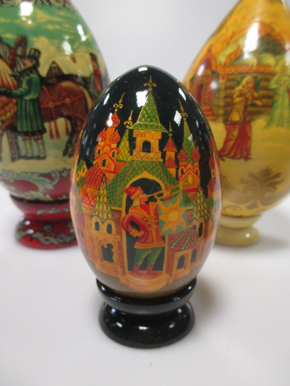 Fifteen various Russian painted eggs, all 20th century with religious