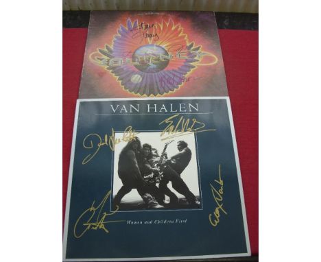 Pop Music, a pair of autographed L P Records, Infinity by Journey (4 signatures) and Women &amp; Children First by Van Halen 