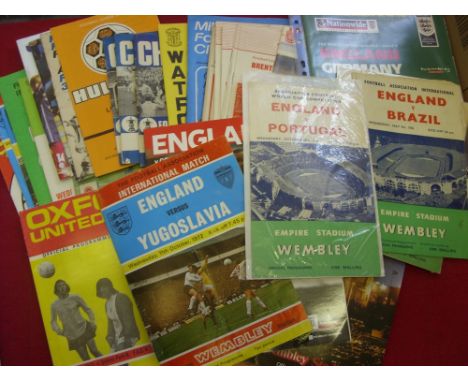 A collection of 65 football programmes to include, England homes from 1951 onwards, 1951 Argentina, 1956 Brazil, Spain, 2000 