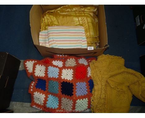A quantity of textiles including crochet, small yellow crochet tablecloth, vintage gold coloured curtains, fabric remnants, e