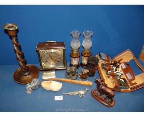 A small quantity of miscellanea including a double helix candlestick, gentleman's travelling vanity case, Eskimo stone beaver