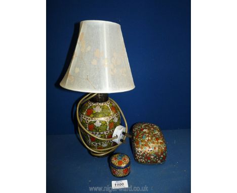 A papier mache Table lamp with pressed leaf shade (base of lamp to top of shade 15") and two papier mache boxes with lids.