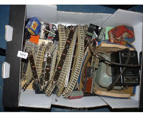 A Hornby Black tank locomotive 69567, (as found), a Meccano Ltd. power control unit, various rolling stock, including Esso, e
