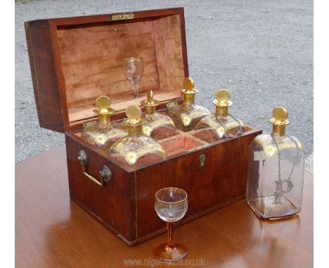 A 19th century light and dark wood strung and inlaid Mahogany/Walnut cased six bottle Decanter Set, the hinged lid opening to