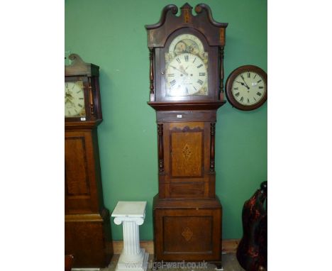 An Oak, Mahogany, Walnut and Fruitwood Arts &amp; Crafts style Longcase Clock having an eight day movement striking on a bell