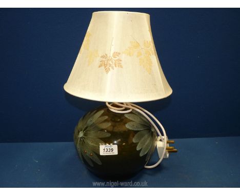 A china ''Lotus'' pottery table Lamp with shade decorated with pressed leaves, 15" tall.