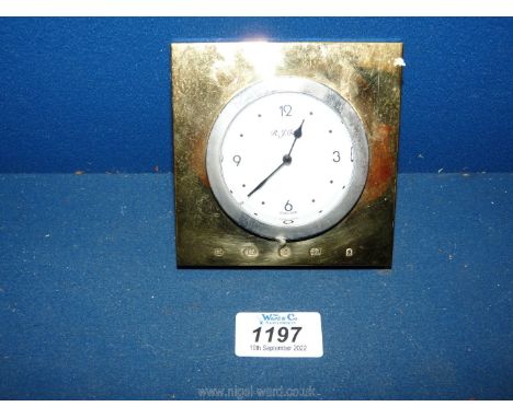 A ''Golden Jubilee Collection'' travel alarm clock with sterling silver, gold plated frame, boxed and sold by Harrod's.