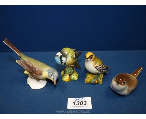 Four small china birds including Beswick Goldcrest (a/f) and a blue tit, Goebel West German blue tit, etc.