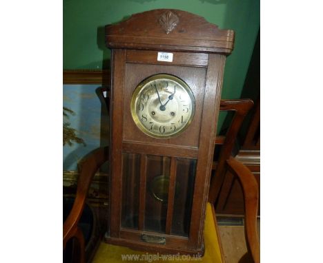 A 100 year old Wall Clock with 2 keys, plaque to base presented to 'Bro Fred Geoghegan on the occasion of his marriage by the