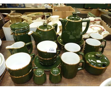 A quantity of Apilco French porcelain green china consisting of four mugs, cups, saucers and tea plates, a milk jug, a sugar 