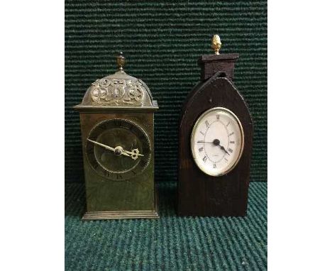 A twentieth century brass mantel clock together with one other (2)