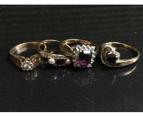 A 9ct gold and diamond ring, a sapphire and diamond ring, a 9ct gold garnet and pearl set ring and another ring (4)