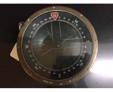 A circular brass ship's compass type P10
