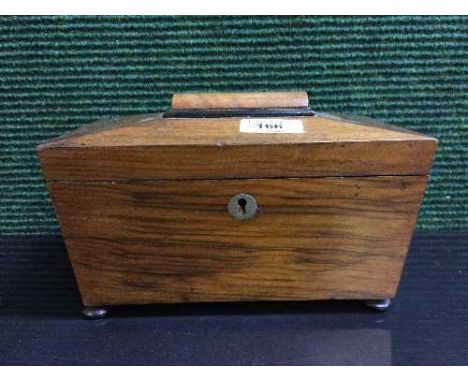 A Victorian mahogany tea caddy 
