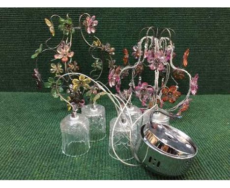 Two decorative metal light fittings with flower decoration and a five way glass light fitting 