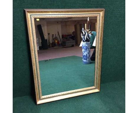 A contemporary gilt framed over mantel mirror 