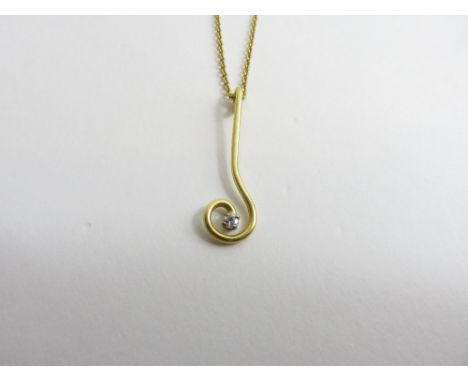 An 18 carat gold diamond set pendant, 1979, the inverted question mark shaped pendant with a small brilliant cut, on an 18 ca