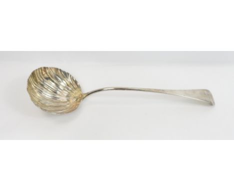 An early George III silver soup ladle, by Thomas &amp; William Chawner, London 1764, the fluted and gadrooned bowl to a monog