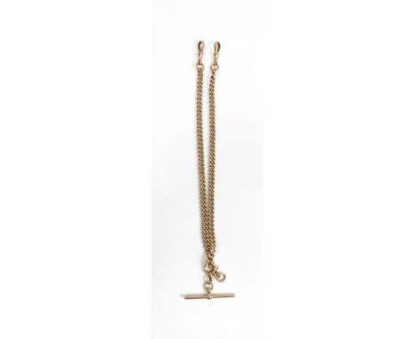 A 9 carat gold watch chain, of uniform solid curb links, with two swivels and a T bar, 38 cm long, 38 g gross