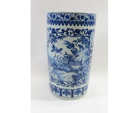 A Chinese blue and white painted stick stand of cylindical form painted with panels of songbirds, character marks to base 48.