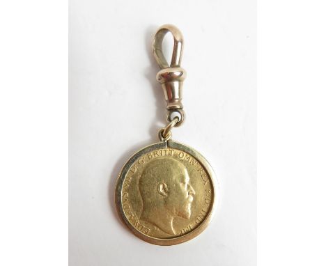 A 1910 half sovereign, in a 9 carat gold pendant mount, with a swivel attached, 6.6 g gross