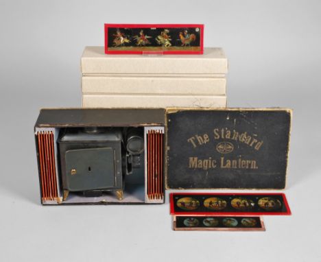 Ernst Plank Laterna Magica + Sammlung Glasbilder"The Standard Magic Lantern", Nürnberg, um 1910, teils gemarkt, Eisenguss, Me