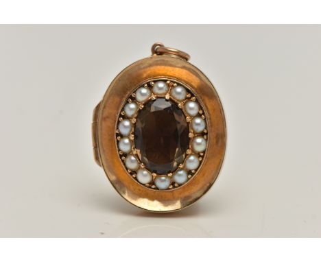 A 9CT GOLD SMOKY QUARTZ AND SPLIT PEARL LOCKET, concaved locket principally set with an oval cut smoky quartz, prong set with