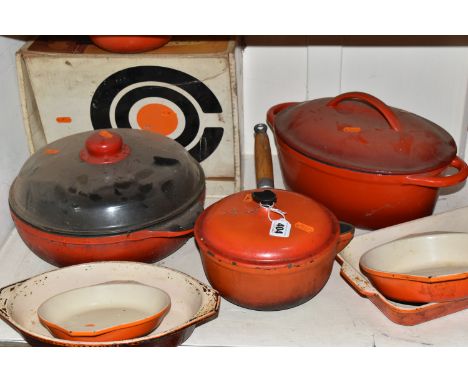 A GROUP OF CAST IRON AND STONEWARE COOKWARE, thirteen pieces to include boxed Le Creuset and other French brands, saucepans, 