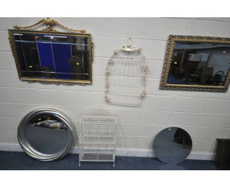 A FRENCH GILT FRAMED WALL MIRROR, with an ewer pediment, 98cm x 77cm, another foliate gilt framed wall mirror, a wire memo bo