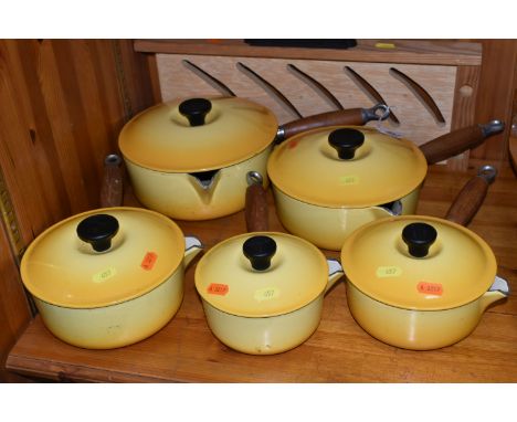 A COLLECTION OF LIDDED LE CREUSET SAUCEPANS IN 'SOLEIL YELLOW', five graduated lidded saucepans, comprising sizes 14,16,18,20
