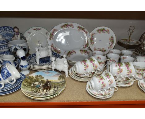 A QUANTITY OF QUEEN'S CHINA 'WOMAN AND HOME' PATTERN TEAWARE, COLLECTOR'S PLATES AND ORNAMENTS, comprising a large oval meat 